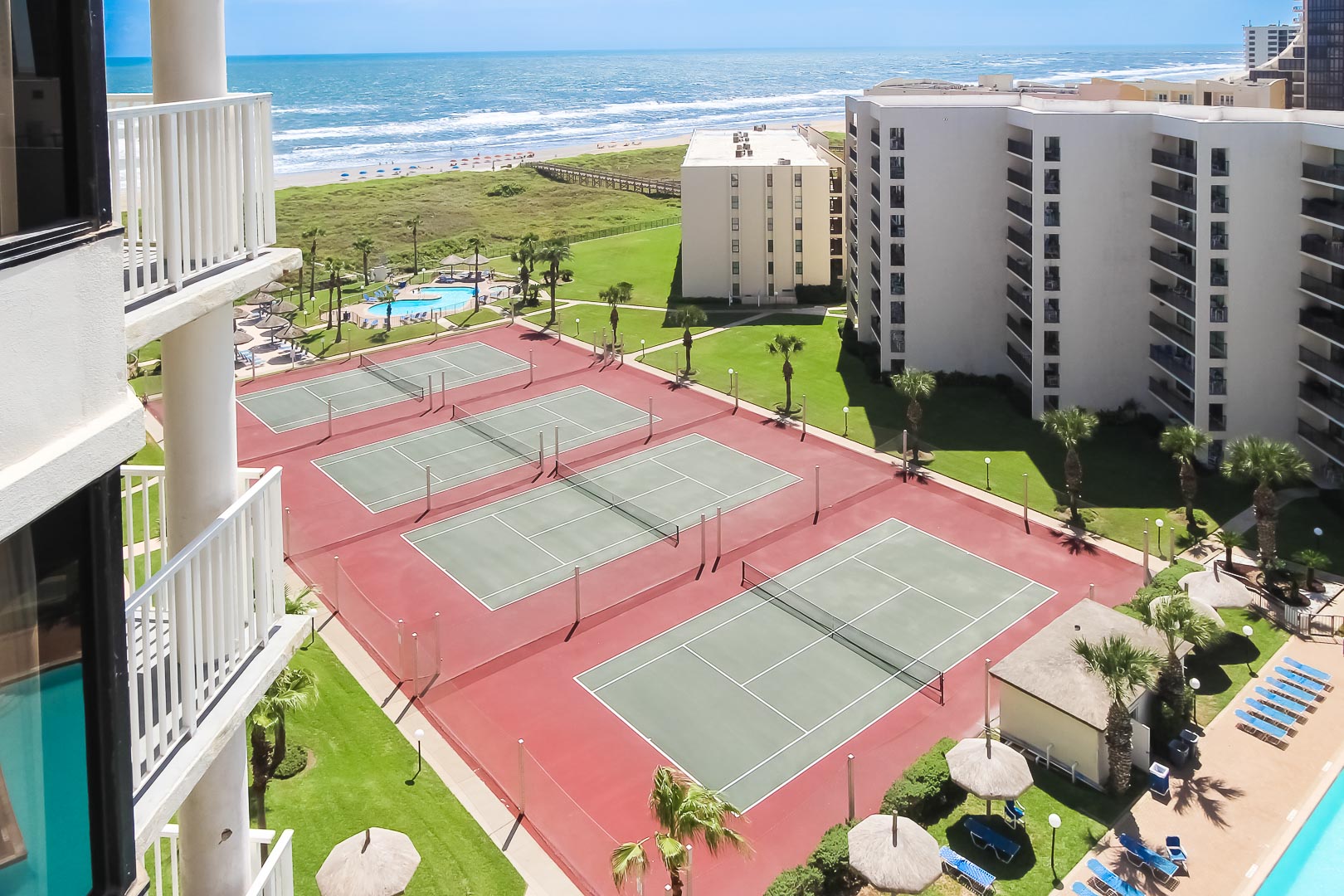 Beachfront Outdoor tennis courts at VRI's Royale Beach and Tennis Club.